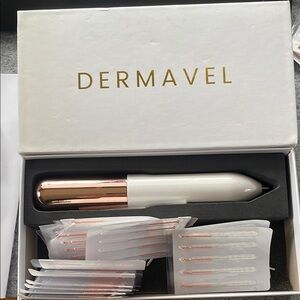 Dermavel White and Rose Gold Beauty Device